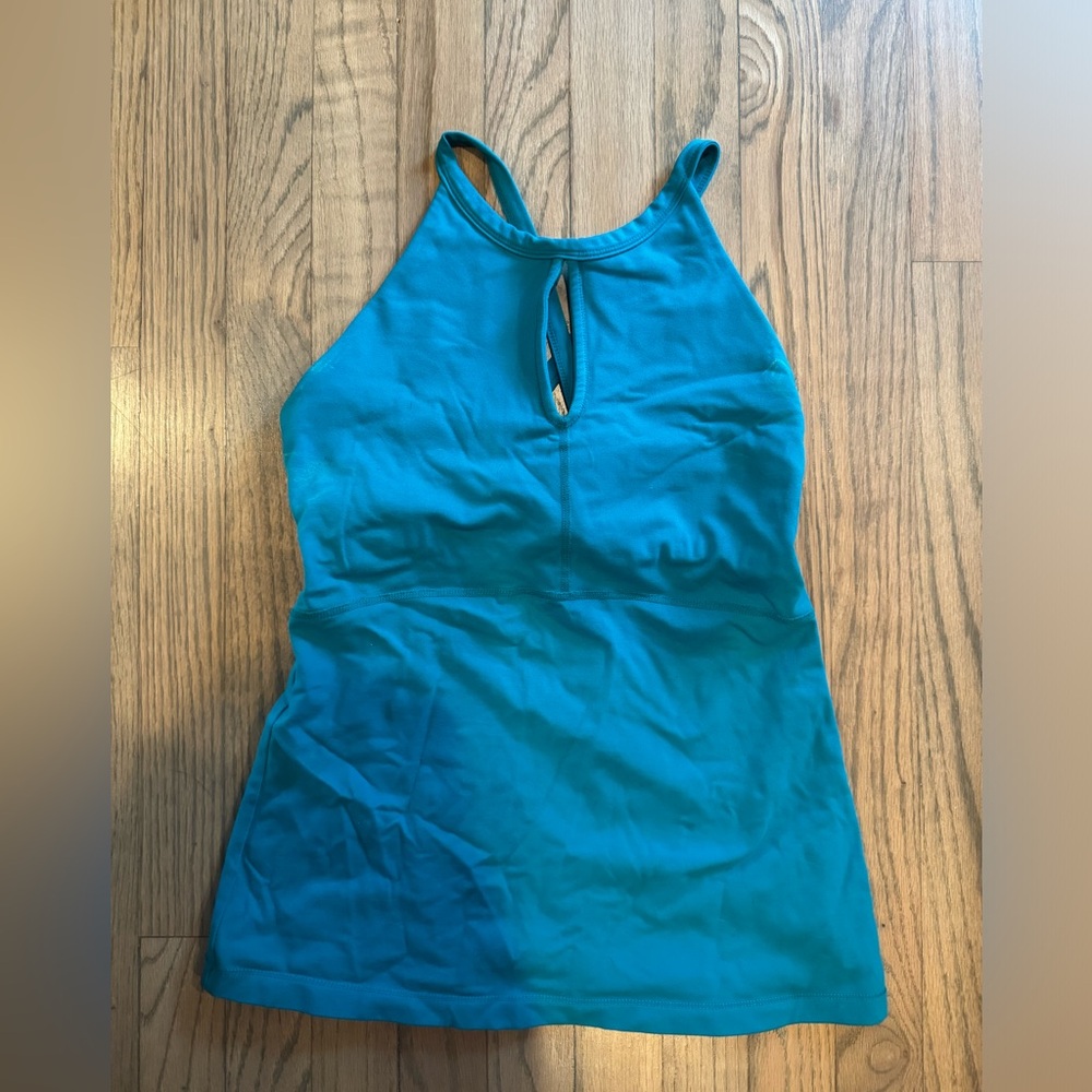 Kira Grace Blue Key Hole Yoga Top. With build in bra. Size medium.